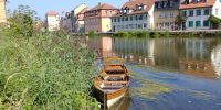Boot auf der Regnitz, Bamberg im Hintergrund